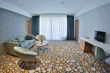 Фото номера Полулюкс с видом на горы Отель Yurd Hotel г. Гах 6